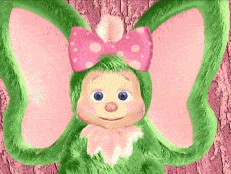 Twig the Wompkee, a green mammal with tan skin and huge pink ears, winking at the viewer as she gives a thumbs-up.